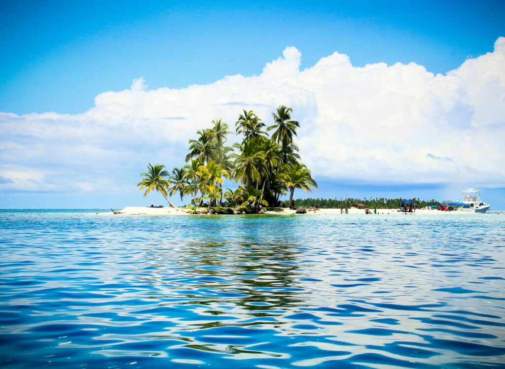 Explore this stunning tropical island with palm trees and crystal-clear waters in Guna Yala, Panama.